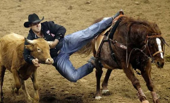 What Are All The Events In A Rodeo? 8 Rodeo Events Explained 4 Steer wrestling timed Omak Stampede